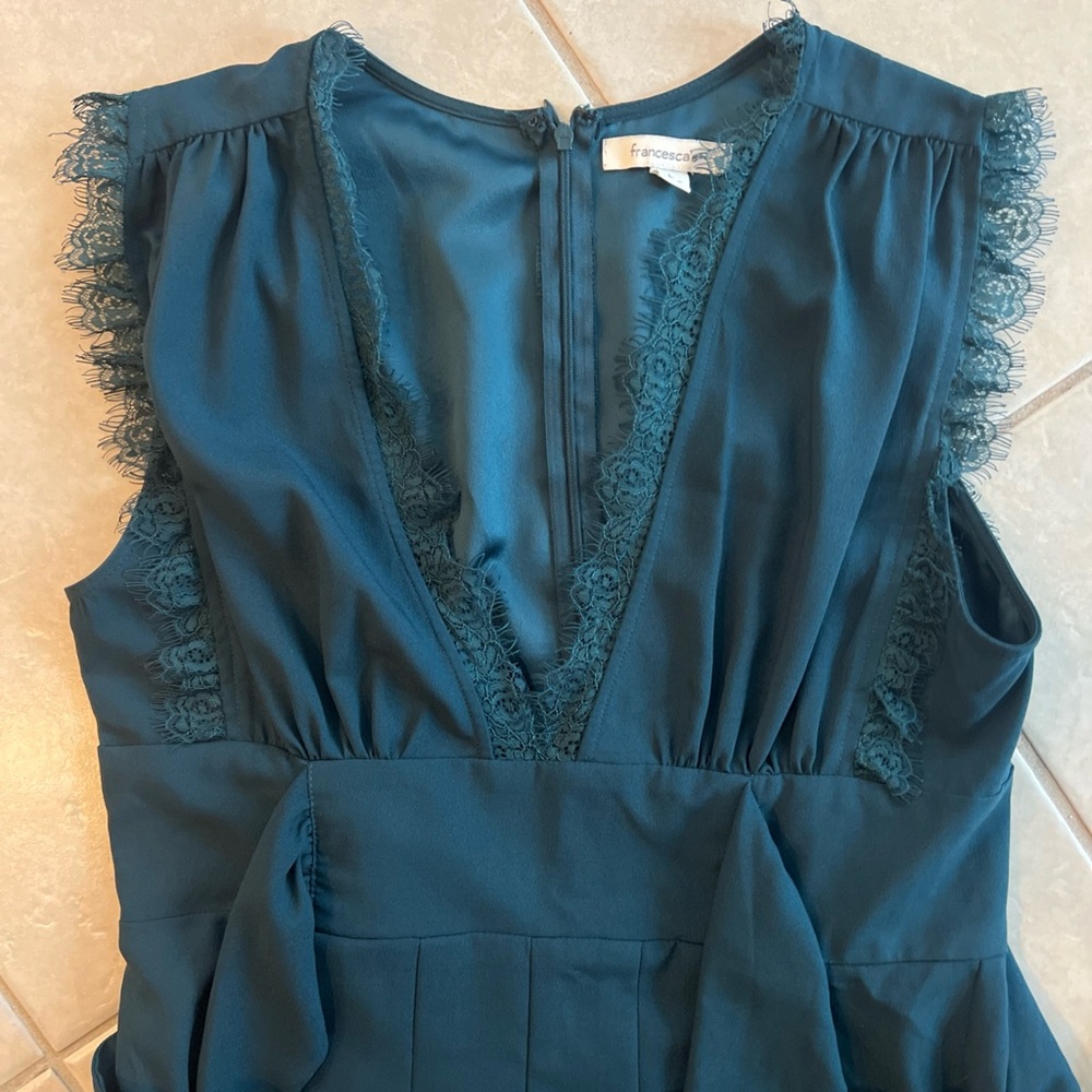 Francesca‘s new without tags teal jumpsuit size large